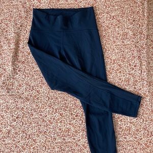 Lululemon leggings with mesh lower legs.